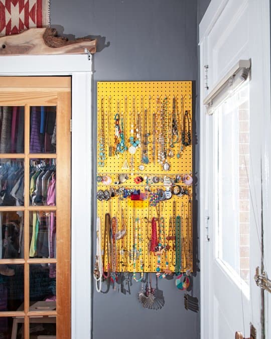 a pegboard can provide a simple way to hang and organise your accessories